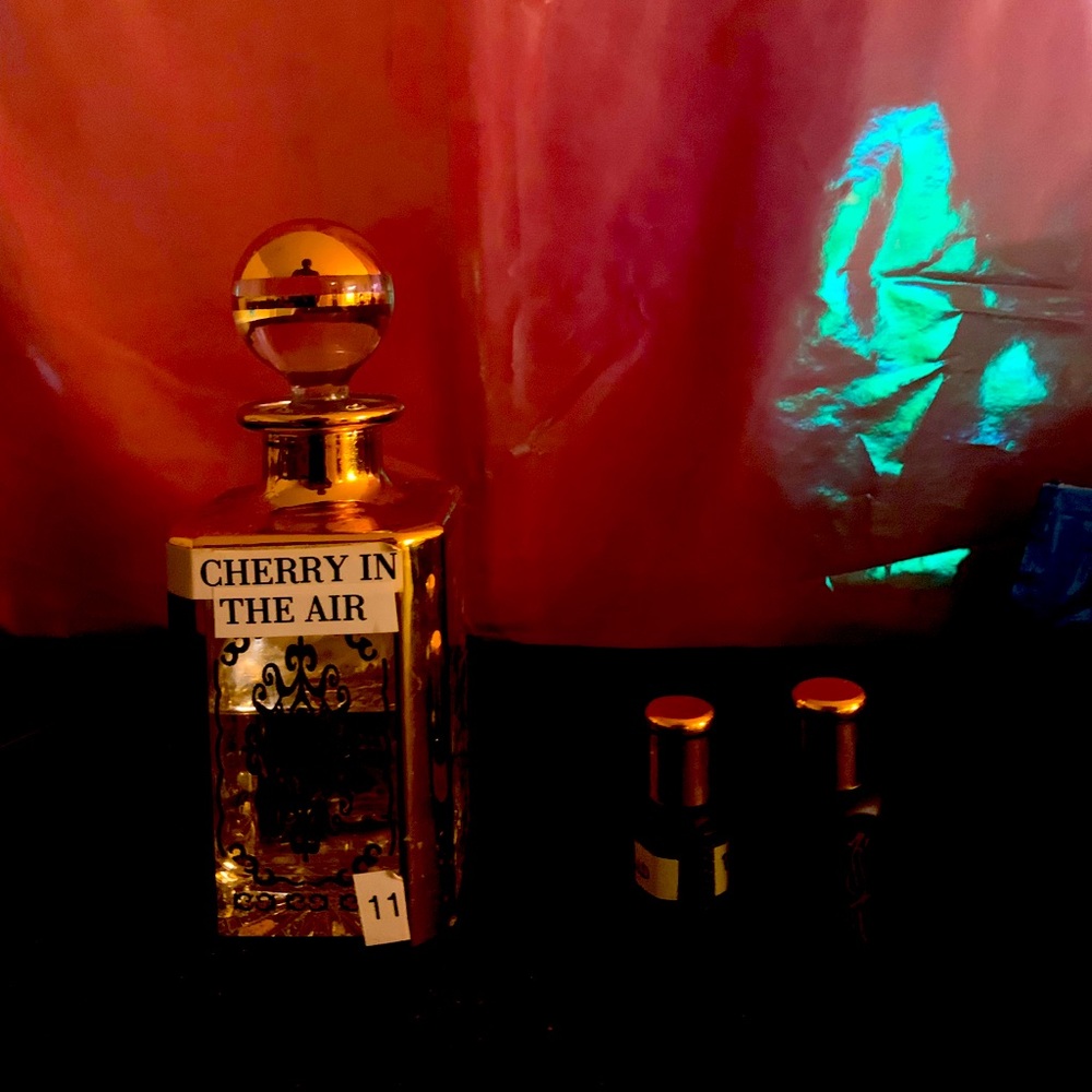Cherry in the air fragrance oil medium black bottle